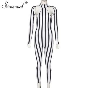 Woman pink and white jumpsuit.